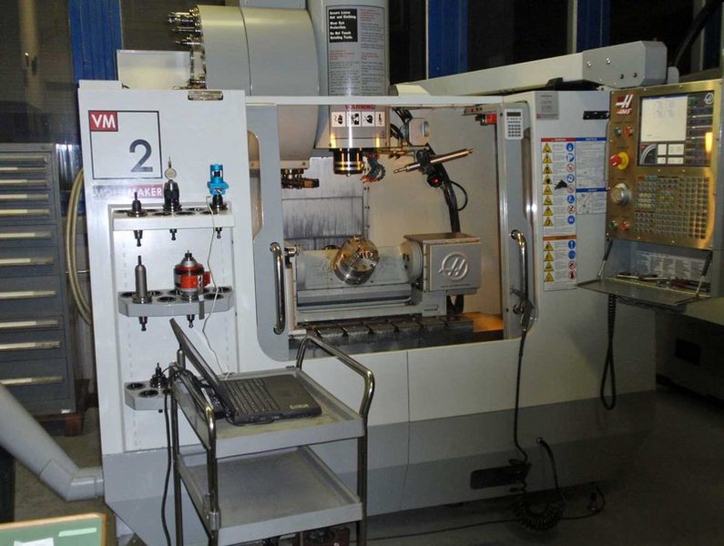 Haas VM2 — 5 axes – atelier d'usinage CNC Pourchet Sàrl, La Chaux-de-Fonds